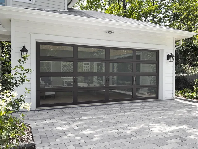 New Canaan Garage Door Repair design specialist presenting custom garage door options to New Canaan homeowner