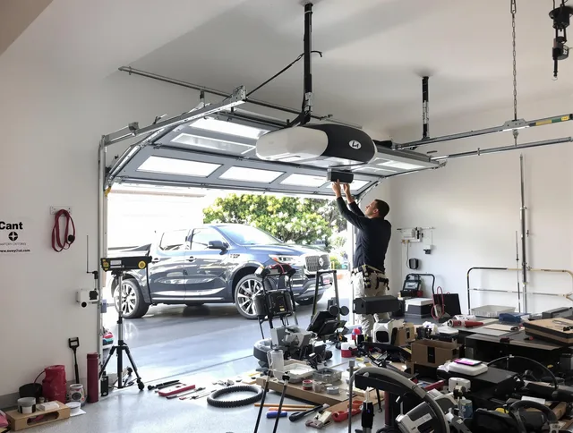 New Canaan Garage Door Repair specialist installing smart garage door opener system in New Canaan home