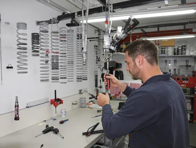 New Canaan Garage Door Repair safety certified technician performing precision spring replacement in New Canaan